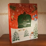 Бумажный пакет ламинированный Магазин Купцов Елисеевых 360х450х120 мм новогодний 